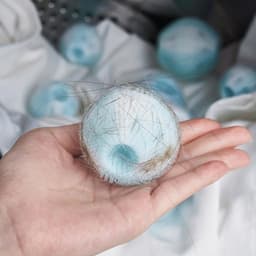 Haarverwijderaar wasmachine 12 stuks - herbruikbare pluisballen - effectief tegen dierenharen - houdt kleding haarvrij - ShopVlot — thumbnail 5