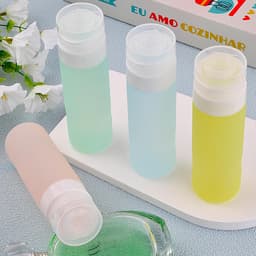 4 stuks reiscontainers, comprimeerbare siliconen slangen, BPA-vrije container, reisflessen met transparante zak, reisfles van siliconen, 90 ml, voor shampoo, lotion, cosmetica — thumbnail 4