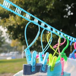 2 stuks- waslijndraad- 5M - Drooglijn voor buiten - Kleding en lakens drogen- weerbestendig - kunststof-Roze en blauw- Ruimtebesparend-Geen ponsen nodig — thumbnail 4