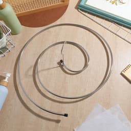 Ruimtebesparende Spiral Hanger voor Bedlinnen en Kleding, Rvs Droogrek voor Plafonds en Lakens — thumbnail 4