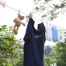 Draagbare Kledinglijn voor Reizen - Verstelbare Winddichte Touw met Clips en Antislip Gespen — thumbnail 2