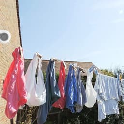 Verstelbare Waslijn van 13m - Dubbele Lijn, Stevige Wandmontage, Ideaal voor Binnen en Buiten Gebruik — thumbnail 5