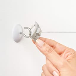 Extendable Wall-Mounted Drying Rack 2 Ropes Automatic Withdrawal System - Including Studs, Screws, and Hooks - Extendable up to 15m — thumbnail 4