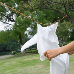 Intrekbare Waslijn - Kledingtouw Reizen - Buiten Kleding Drogen - Roestvrij Staal - 10 Meter - Meerkleurig — thumbnail 5