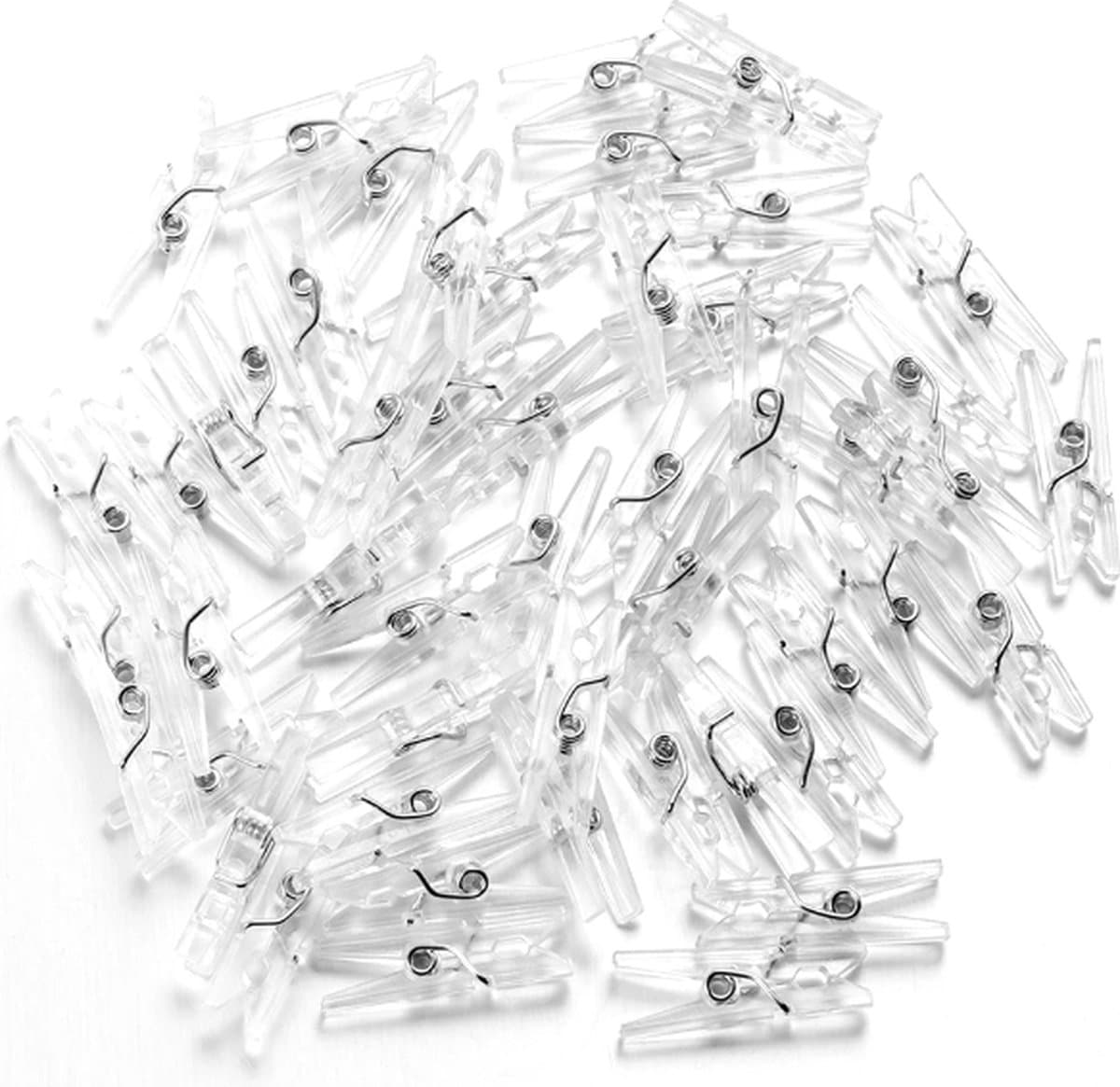 FSW-Products - Kleine Mini Knijpers - 50 STUKS - Transparant - Knijpertjes - Fotoknijpers - Geboorte Wasknijpers - 2.5 CM - Kaartknijpers - Foto knijpers - Knijper om foto's aan op te hangen - Wasknijpers - Kerstkaart hangers - Polaroid - Decoratie — afbeelding 1